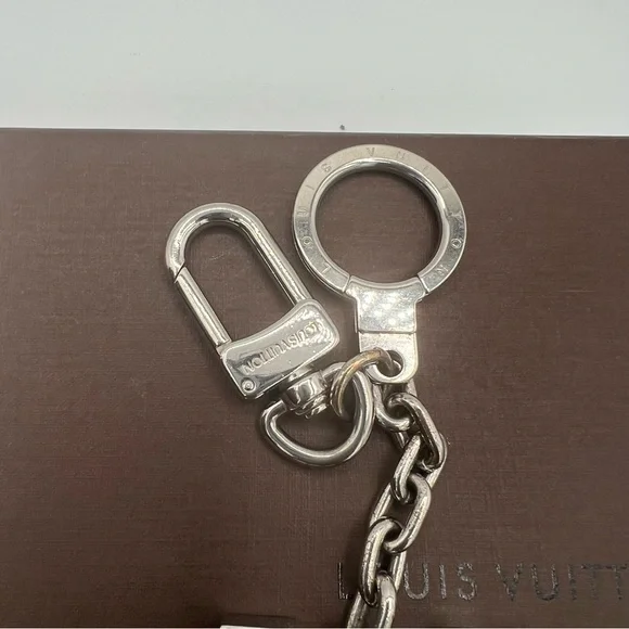 Authentic Louis Vuitton key charm ❤️silver